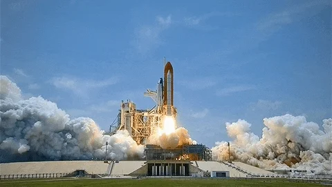 Space Shuttle taking off